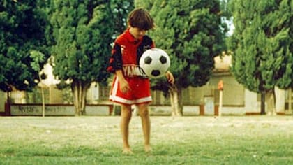 Lionel Messi, de niño, con la camiseta de Newells