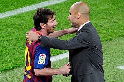 Lionel Messi y Pep Guardiola