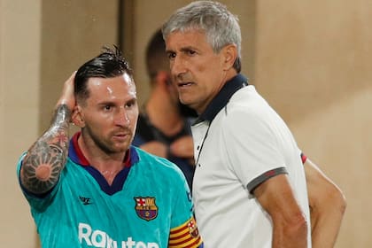 Lionel Messi y Quique Setien