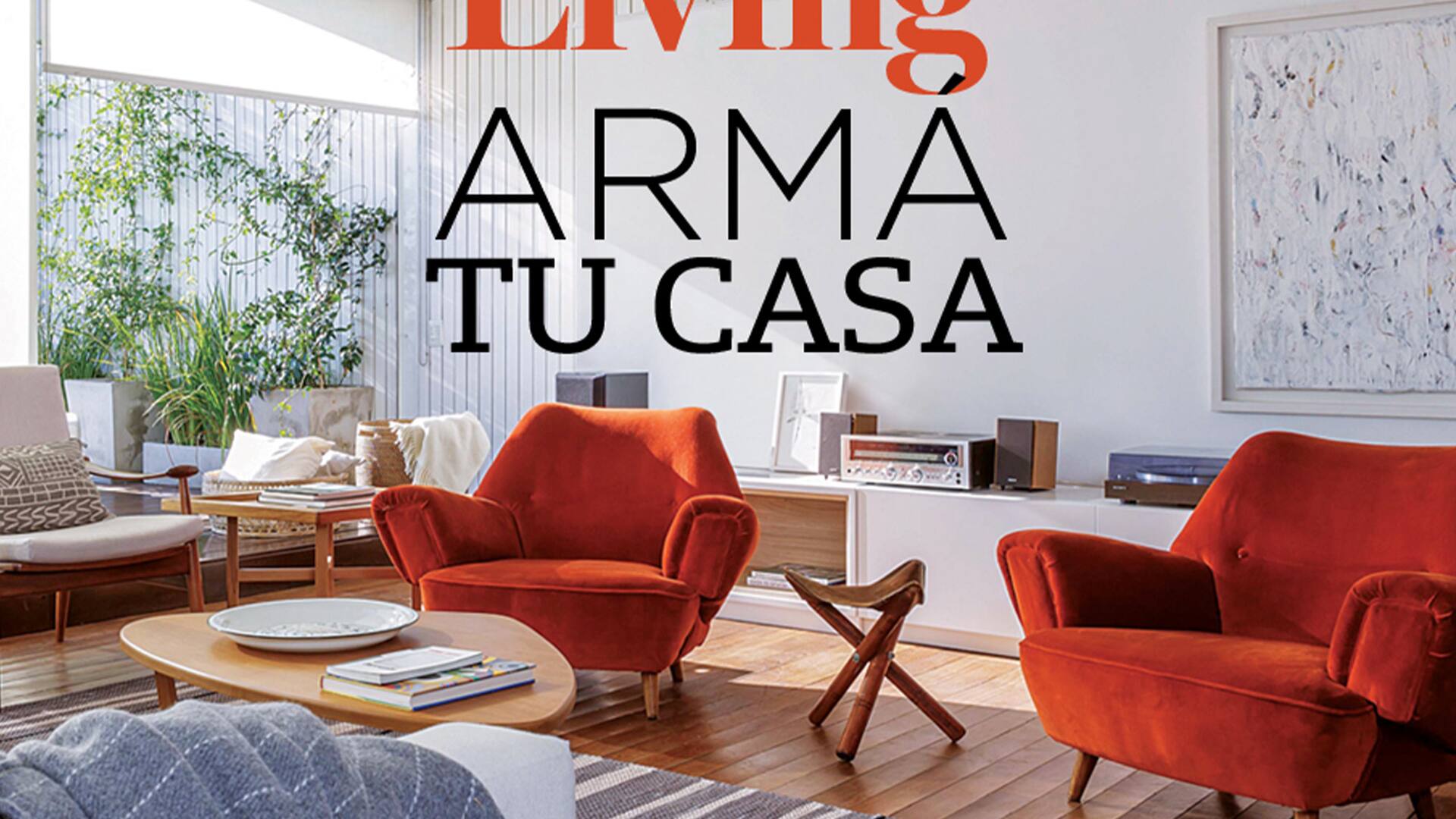 Living con sillones rojos con logo de Living Armá tu Casa
