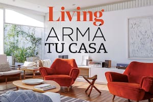 Living con sillones rojos con logo de Living Armá tu Casa