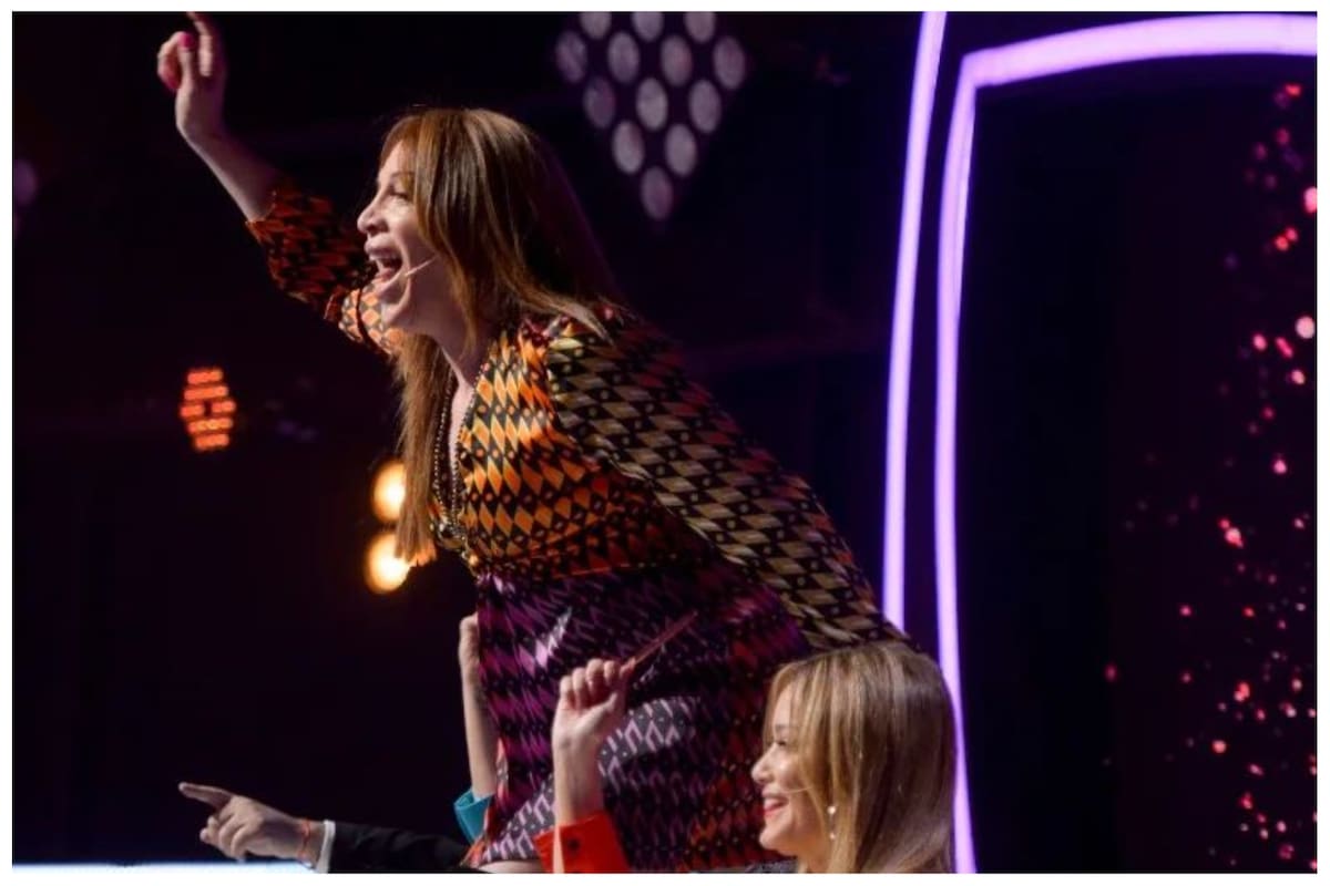 Lizy Tagliani se volvió loca con un participante de Quién es la Máscara y terminó arriba de una mesa