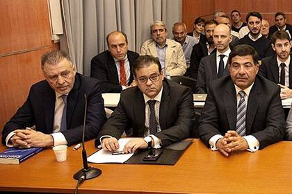 López y Echegaray; atrás, Aníbal Fernández