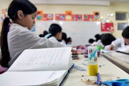 Los chicos regresaron a clases tras 59 días de huelga; en 2012, iniciarán el ciclo lectivo el 13 de febrero