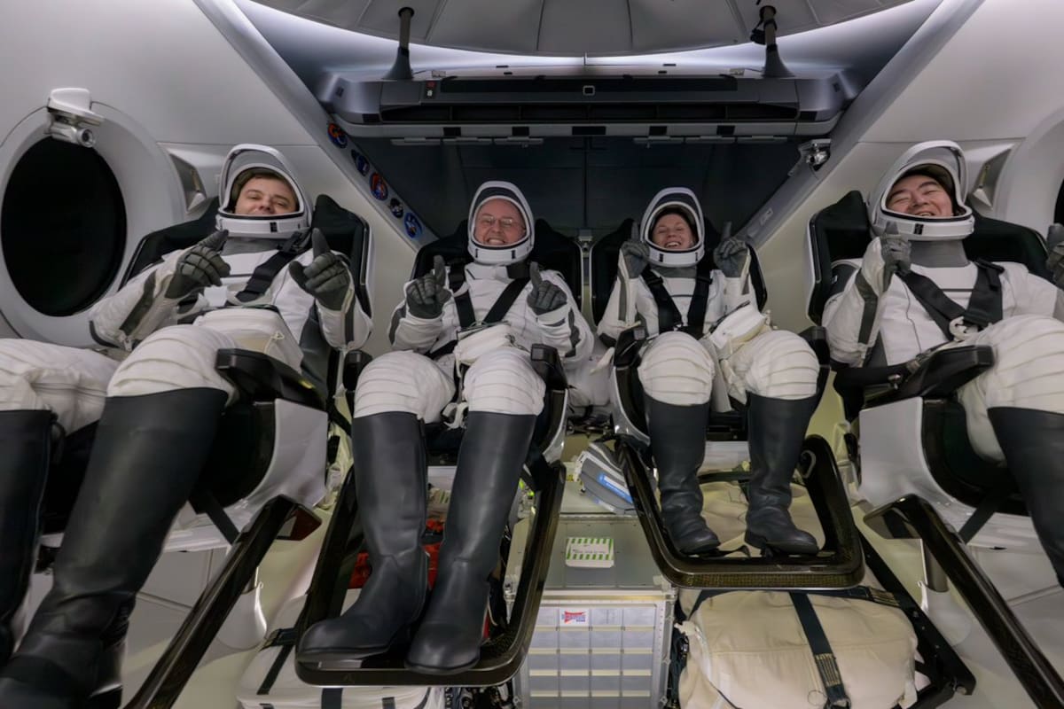 Los cuatro astronautas en el regreso a Tierra