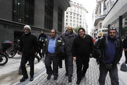 Los delegados sindicales Dellecarbonara, Segovia y Pianelli