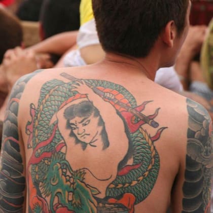 Los dragones y la lucha son temáticas frecuentes en los tatuajes de la yakuza.