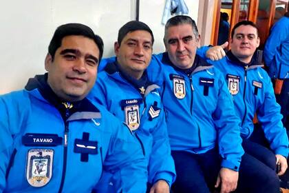 Eduardo Enrique Tavano (izquierda), junto a sus compañeros