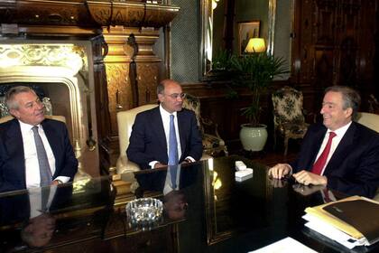 Los españoles Gerardo Díaz Ferrán y Gonzalo Pascual con el presidente Néstor Kirchner