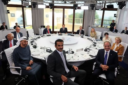 Los miembros del G7 y líderes invitados durante la cumbre en Evian