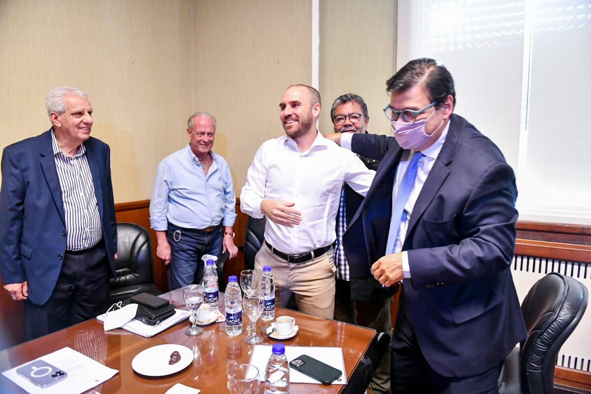 Los ministros Martín Guzmán (Economía) y Claudio Moroni (Trabajo) en una visita a la CGT
