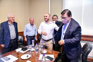 Los ministros Martín Guzmán (Economía) y Claudio Moroni (Trabajo) en una visita a la CGT