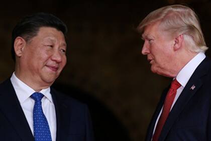 Los presidentes de China, Xi Jinping, y de EE.UU. Donald Trump