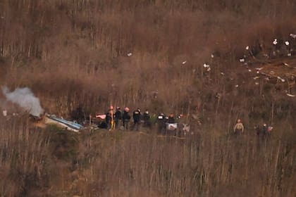 Los restos del helicóptero, en el lugar del accidente