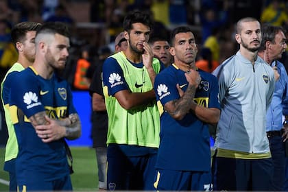 Los rostros de Nández, Tevez y Benedetto, tras la derrota ante River en la final de la Supercopa Argentina de hace un año