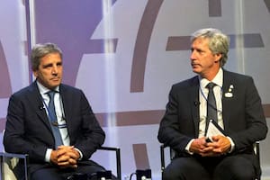 Luis Caputo y Santiago Bausili
