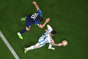 LUSAIL CITY, QATAR - DECEMBER 13: Lionel Messi of Argentina controls the ball against Josko Gvardiol of Croatia during the FIFA World Cup Qatar 2022 semi final match between Argentina and Croatia at Lusail Stadium on December 13, 2022 in Lusail City, Qatar. (Photo by Dan Mullan/Getty Images)