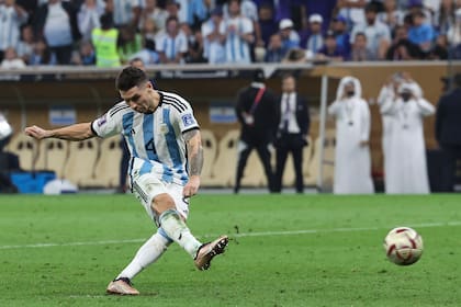 LUSAIL CITY, QATAR - DECEMBER 18: Gonzalo Montiel of Argentina scores the winning penalty to win the World Cup during the FIFA World Cup Qatar 2022 Final match between Argentina and France at Lusail Stadium on December 18, 2022 in Lusail City, Qatar. (Photo by Ian MacNicol/Getty Images)