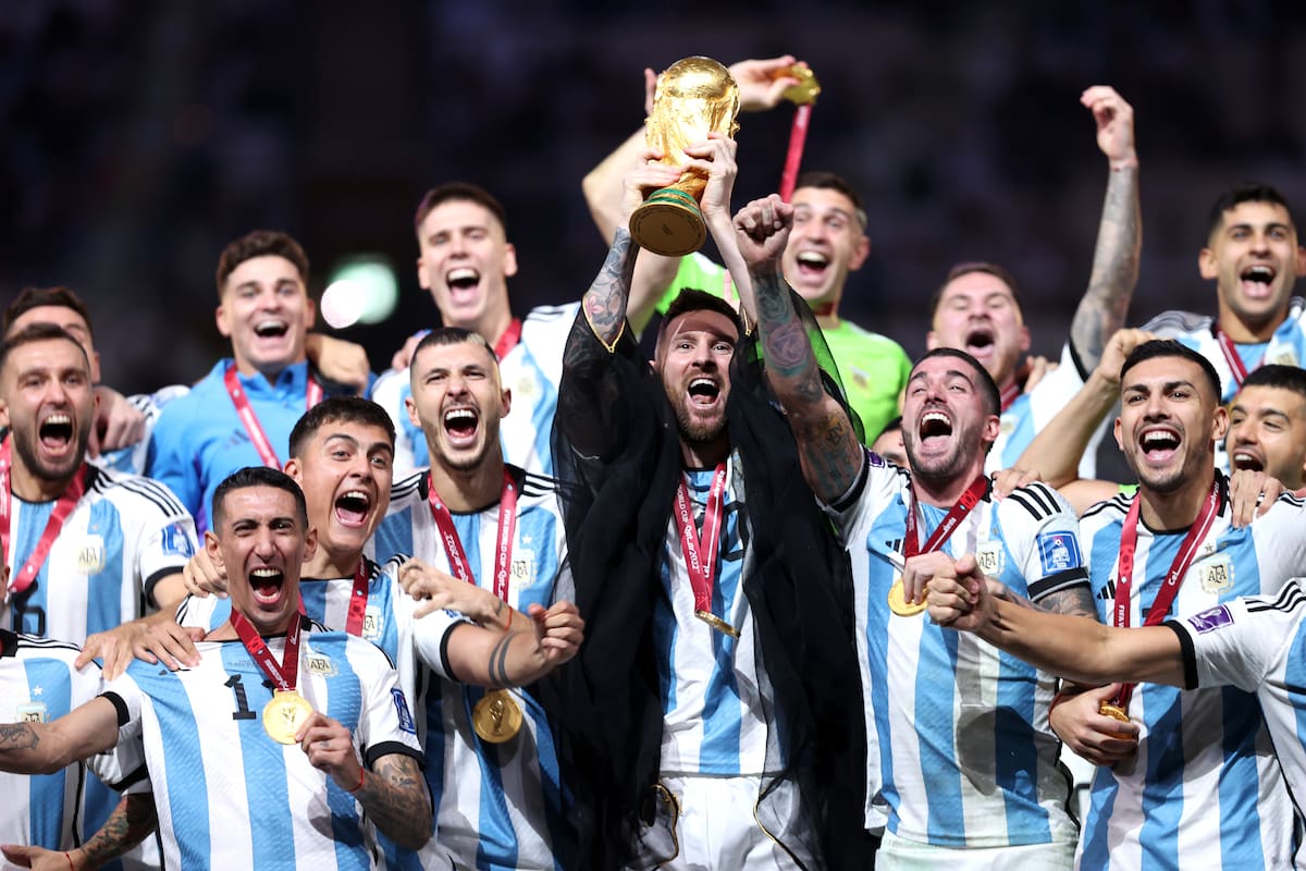 LUSAIL CITY, QATAR - DECEMBER 18: Lionel Messi of Argentina lifts the FIFA World Cup Qatar 2022 Winner's Trophy during the FIFA World Cup Qatar 2022 Final match between Argentina and France at Lusail Stadium on December 18, 2022 in Lusail City, Qatar. (Photo by Julian Finney/Getty Images)