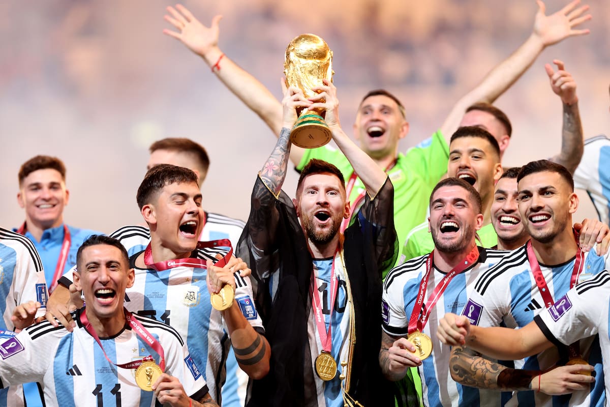 LUSAIL CITY, QATAR - DECEMBER 18: Lionel Messi of Argentina lifts the FIFA World Cup Qatar 2022 Winner's Trophy during the FIFA World Cup Qatar 2022 Final match between Argentina and France at Lusail Stadium on December 18, 2022 in Lusail City, Qatar. (Photo by Julian Finney/Getty Images)