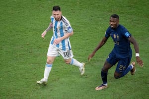 LUSAIL CITY, QATAR - DECEMBER 18: Lionel Messi of Argentina and Marcus Thuram of France in action during the FIFA World Cup Qatar 2022 Final match between Argentina and France at Lusail Stadium on December 18, 2022 in Lusail City, Qatar. (Photo by Sebastian Frej/MB Media/Getty Images)