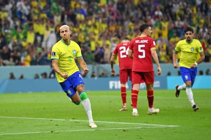 LUSAIL CITY, QATAR - NOVEMBER 24: Richarlison of Brazil celebrates after scoring their team's first goal during the FIFA World Cup Qatar 2022 Group G match between Brazil and Serbia at Lusail Stadium on November 24, 2022 in Lusail City, Qatar. (Photo by Justin Setterfield/Getty Images)