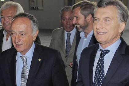Macri con Acevedo y Betnaza, en un evento de la UIA