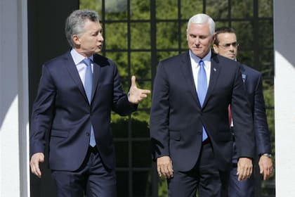 Macri, con el vicepresidente Pence, cuando visitó la Argentina y se trató el tema de la importación de carne de cerdo, entre otros