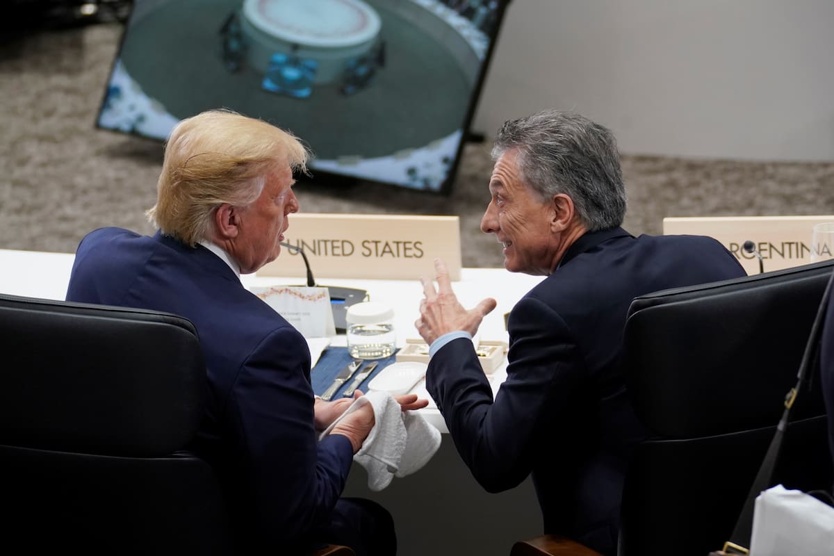 Macri y Trump comparten asientos al lado durante los plenarios