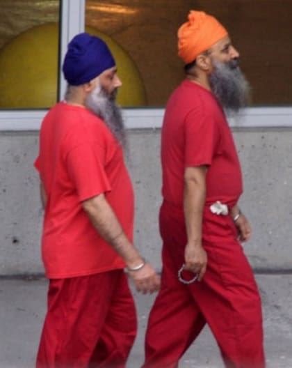 Malik y Bagri mientras estuvieron bajo custodia en 2004 (Foto: Getty Images)