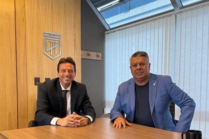 Marcelo Moretti y un defensor de su causa, Claudio 'Chiqui' Tapia, que desde AFA lo respaldó en su conflicto con San Lorenzo.