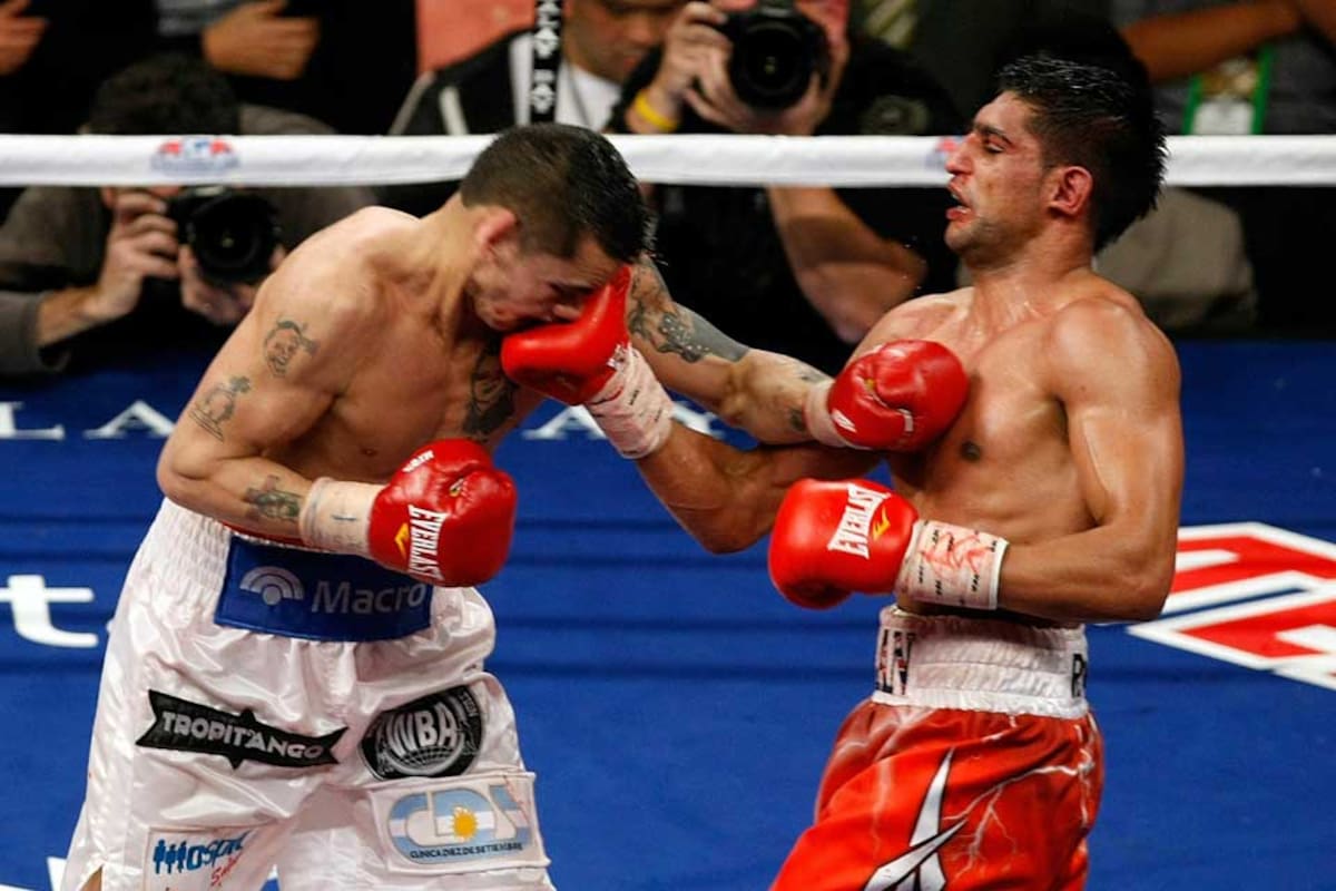 Marcos Maidana sufrió ante Amir Khan, pero se aseguró su trabajo con Golden Boy