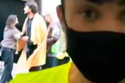 Mario en primer plano y, de fondo, el personaje del Profesor