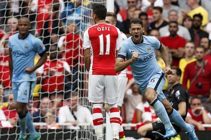 Martín Demichelis celebra un gol de Manchester City ante Arsenal, en 2014