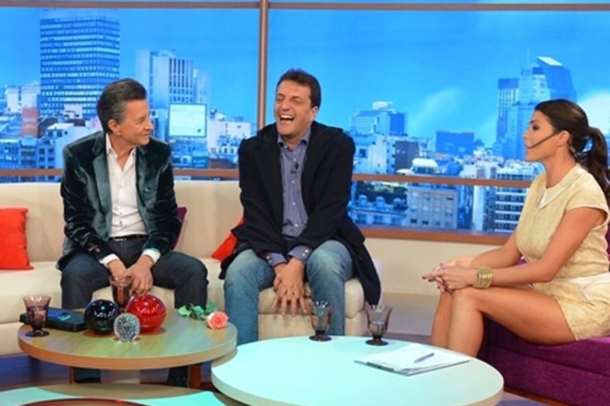 Massa, junto a Palito, en el living de Pamela David