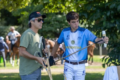 Matías Ballesteros y su hijo, Tomás, en palenques.