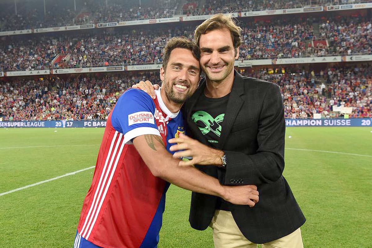 Matías Delgado (ex futbolista de Basilea) y Roger Federer