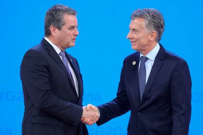 Roberto Azevedo (director general de la OMC) y Mauricio Macri