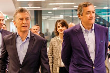 Mauricio Macri y Enrique Cristofani, presidente de Santander Argentina