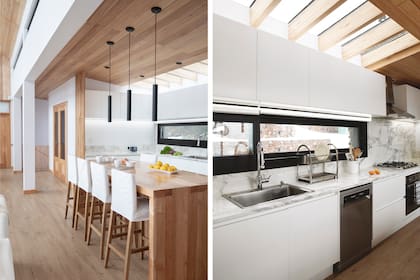 Mesada de cocina en Neolith ‘Calacatta’. Alacenas y bajomesadas laqueados en blanco (Johnson Acero).