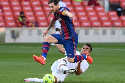 Messi y Casemiro, en otros tiempos, con los colores de Barcelona y Real Madrid