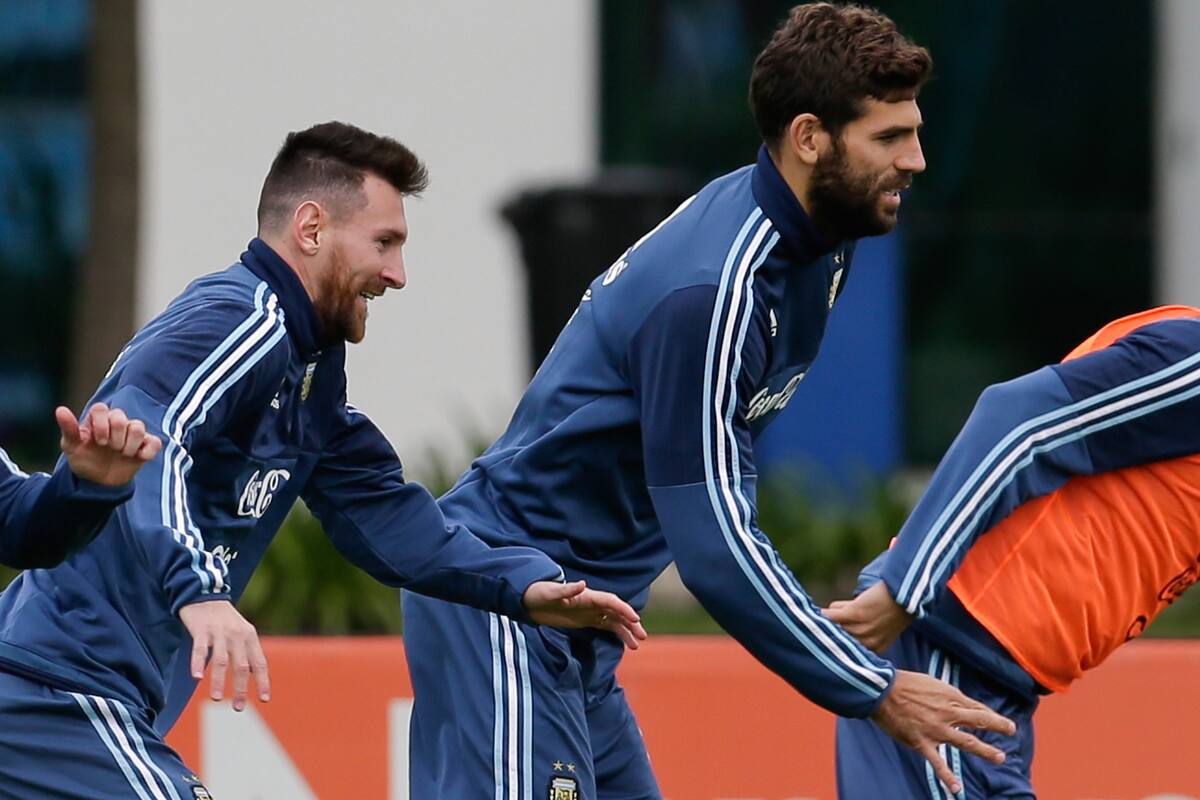 Messi y Federico Fazio