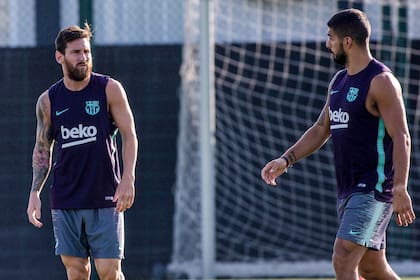 Messi y Suarez, apuntados por la prensa española