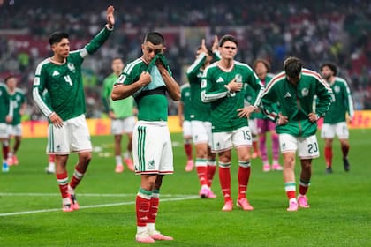 Mexico players react following the World Cup round of 16 soccer match between Mexico and England in Mexico City, Sunday, July 5, 2026. (AP Photo/Natacha Pisarenko)