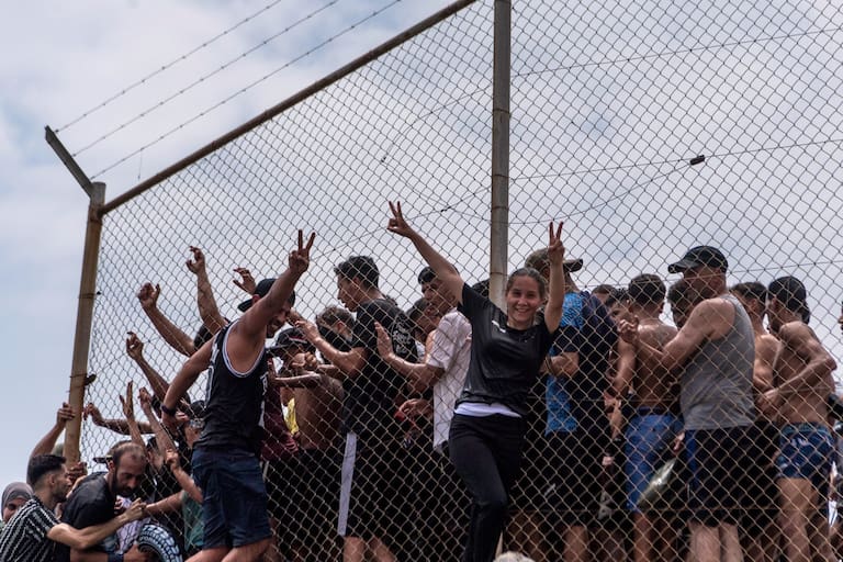 Migrants cross from Morocco into the Spanish enclave of Ceuta, Thursday, July 30, 2026. (AP Photo/Antonio Sempere)