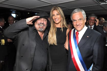 Miguel Piñera junto con su ex mujer, la modelo Belén Hidalgo, y su hermano Sebastián, actual presidente de Chile.