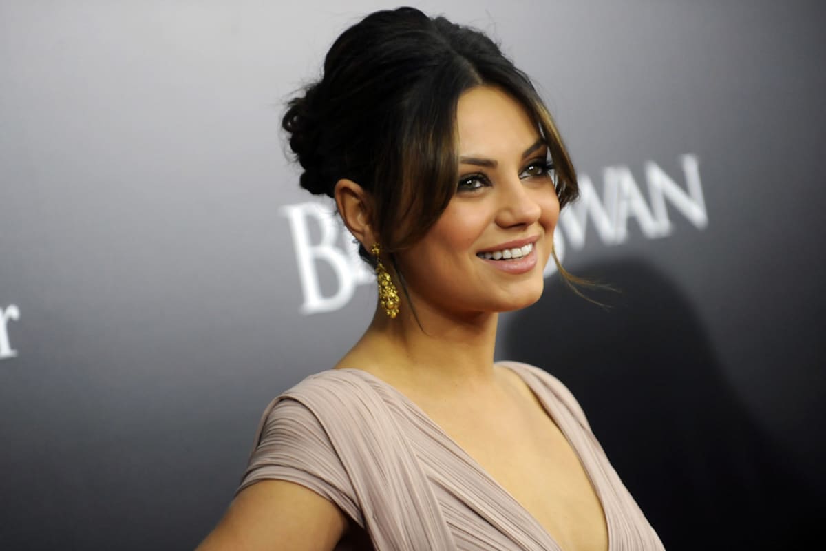 Mila Kunis, radiante en la proyección de Black Swan