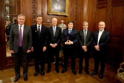 Milei en un encuentro organizado por JP Morgan, junto con Pablo Quirno y Luis Caputo