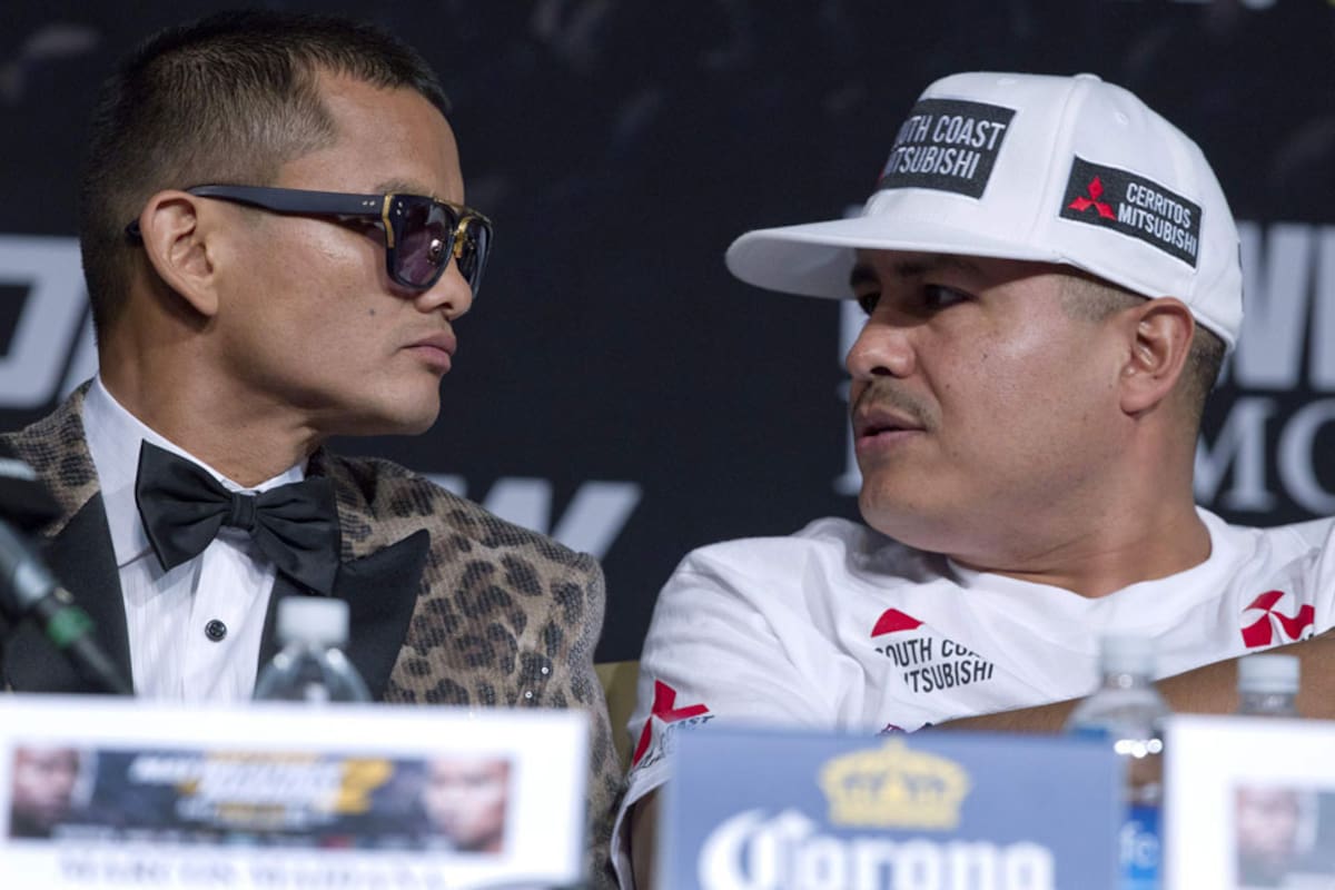 Mirada desafiante: Maidana y su entrenador