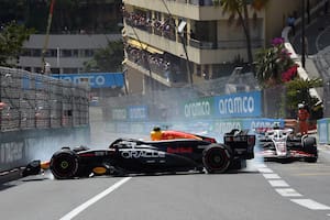 MONTE-CARLO, MONACO - MAY 26: Sergio Perez of Mexico driving the (11) Oracle Red Bull Racing RB20 and Kevin Magnussen of Denmark driving the (20) Haas F1 VF-24 Ferrari (obscured) crash at the start during the F1 Grand Prix of Monaco at Circuit de Monaco on May 26, 2024 in Monte-Carlo, Monaco. (Photo by Getty Images/Getty Images)